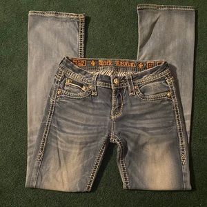 No stains, rips or tears. Missing the R on the back label.